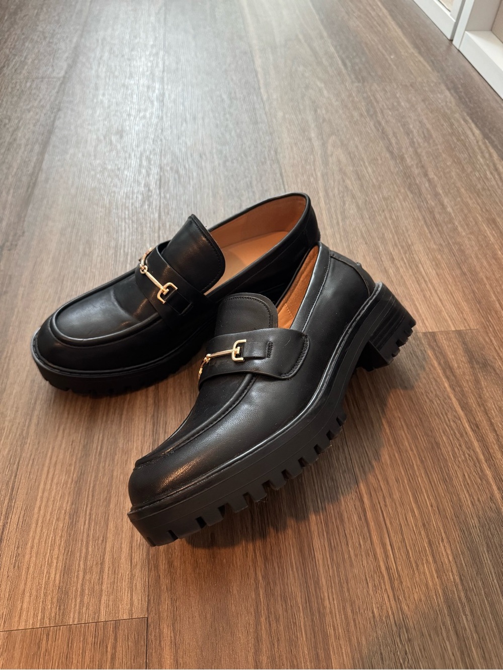 Black Leather Lug-Sole Loafers with Gold Accent